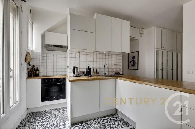 Afficher la photo en grand Appartement F2 à vendre - 2 pièces - 41.72 m2 - PARIS - 75018 - ILE-DE-FRANCE - Century 21 Les Abbesses