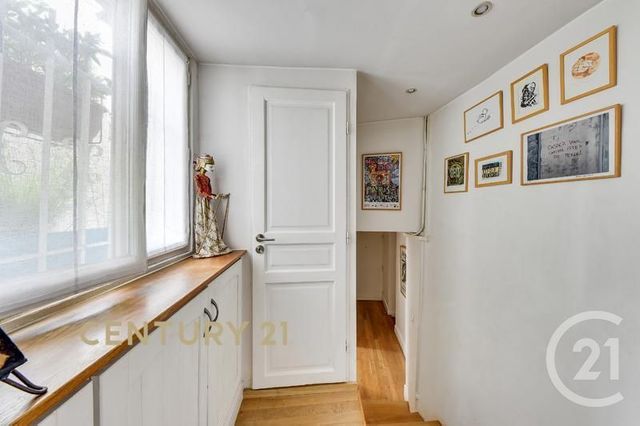 Afficher la photo en grand Appartement F5 à vendre - 4 pièces - 84.57 m2 - PARIS - 75018 - ILE-DE-FRANCE - Century 21 Les Abbesses