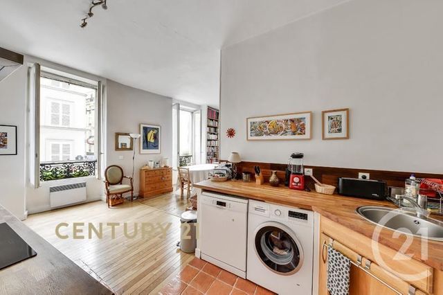 Afficher la photo en grand Appartement F5 à vendre - 4 pièces - 84.57 m2 - PARIS - 75018 - ILE-DE-FRANCE - Century 21 Les Abbesses